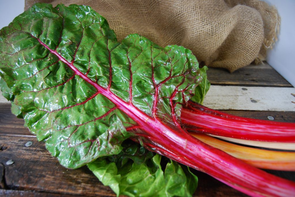 Mmm, rainbow chard. So many potential uses for any meal. Breakfast: sauteed with onions and put in an omelette; lunch: stir fried as a side; dinner: rainbow chard potato casserole. 