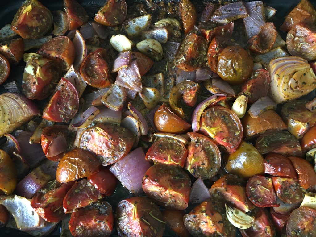 Oven-roasted veggies ready to be made into tomato sauce. From the class: How to Make Pizza Sauce with Fresh Tomatoes